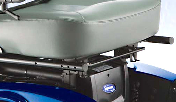 Gray Vinyl Van Seat Assembly for Invacare M71, featuring a high-back seat, detachable headrest, flip-up armrests, and under-seat frame for secure attachment.