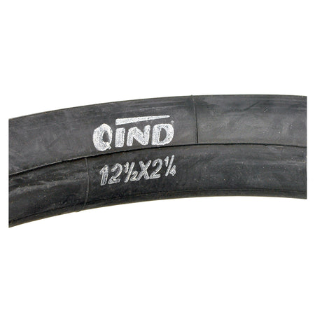 Close-up of a 12-1/2x2-1/4 Razor Pocket Mod Wide Tread Tire, featuring a black rubber surface with white text, ideal for Razor Pocket Mod scooters.