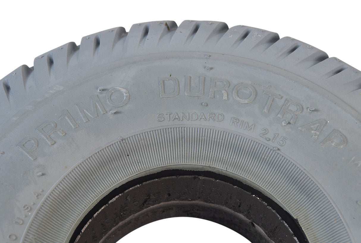 Close-up of the Primo 3.00-4 (10x3, 260X85) Foam-Filled Mobility Tire (2-5/8 Bead Width) with Durotrap C9210 Tread, showcasing detailed tread pattern and robust, flat-free design.