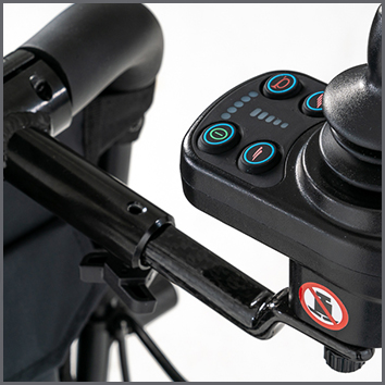 Close-up of the Attendant Control Bracket for the Jazzy Carbon Power Chair, highlighting its joystick mount and easy-to-install design for improved caregiver operation and control.