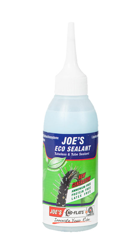 Joe's Eco Sealant - 125 ml Bottle, featuring a close-up of a white plastic bottle with a spout cap, designed for tubeless tires and inner tubes, latex-free and environmentally friendly.