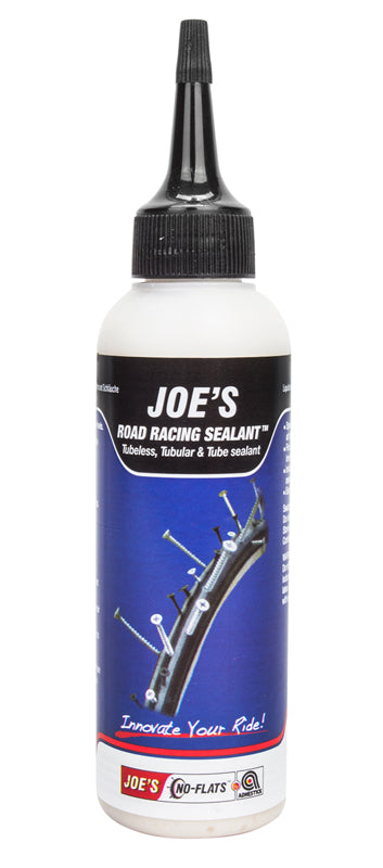 Joe's Road Racing Sealant - 125 ml Bottle, featuring a white bottle with a black cap and blue label, designed for high-pressure road bike tires, instantly seals punctures up to 3mm.