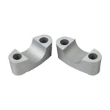 Handlebar Clamps for the Coleman CT200U-EX Mini Bike (Set of 2), showing two silver metal parts with multiple holes, suitable for both camo-finished and vivid red CT200U-EX models.