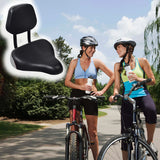 Backrest Saddle Seat for Bikes & Scooters, shown on a woman's bike. Features an integrated adjustable backrest, providing extra comfort. Ideal for adult trikes and standard 7/8 seat posts.