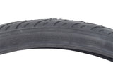 Close-up of the 26x1.5 Black Flat Shield MTN Bicycle Tire by Sunlite, showcasing detailed tread pattern and robust synthetic rubber construction. Ideal as a replacement for 26-inch bike rims.