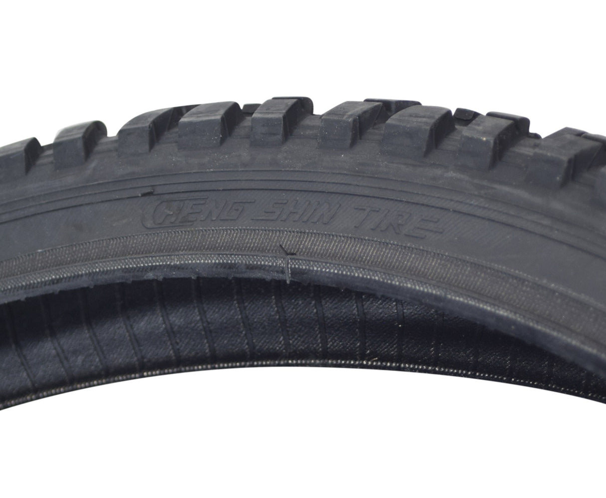 Close-up of the 26x1.95 Black Shipman CST797 Bicycle Tire from Sunlite, highlighting its detailed tread pattern and durable rubber construction, perfect for replacing old bike tires.