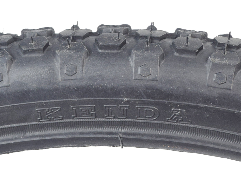 26x2.125 Cruiser 80 Bicycle Tire by Sunlite with pronounced tread pattern, ideal for bike replacements.