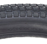 Close-up of a 26x2.125 Black Cruiser 927 Bicycle Tire showcasing detailed tread patterns from Sunlite, ideal for replacing old bike tires with a reliable, high-quality option.