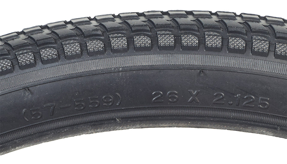 26x2.125 Black Cruiser 927 Bicycle Tire by Sunlite, featuring a detailed tread pattern, ideal for replacing old bike tires.