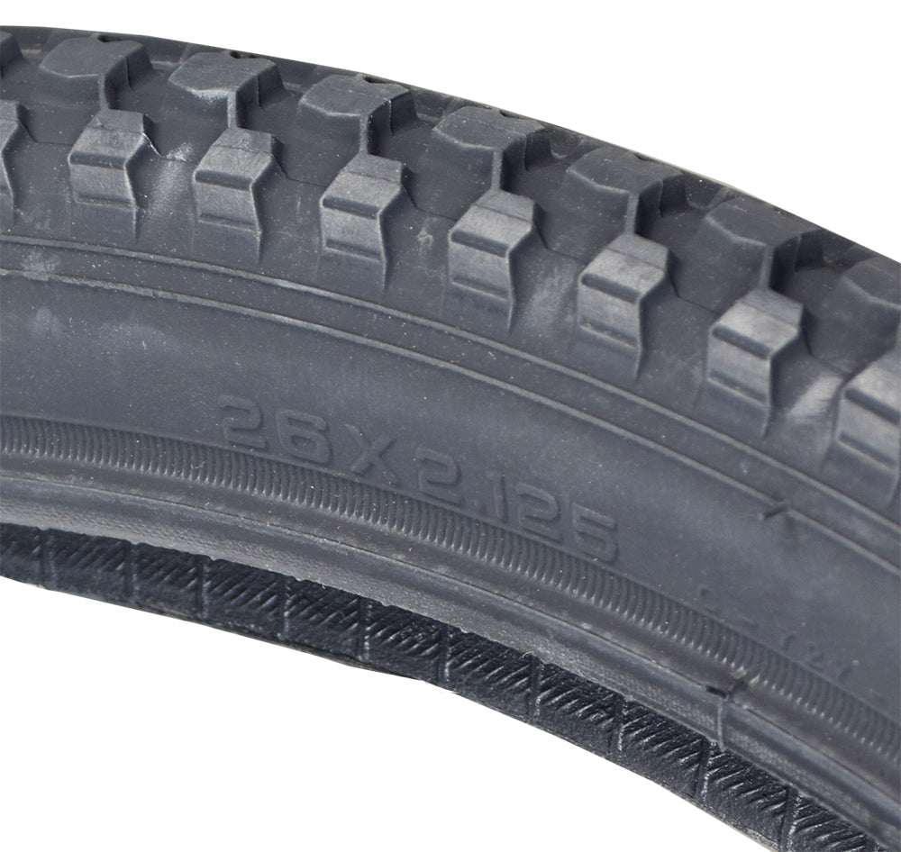 Close-up of a 26x2.125 Black MTB Raised Center Bicycle Tire from Sunlite, showcasing the detailed tread pattern and durable synthetic rubber material.