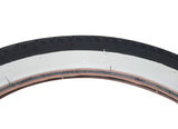 Close-up of a 16x1.75 Black/White Street Bicycle Tire from Sunlite, highlighting its tread pattern and sturdy design, ideal for replacing old bike tires.