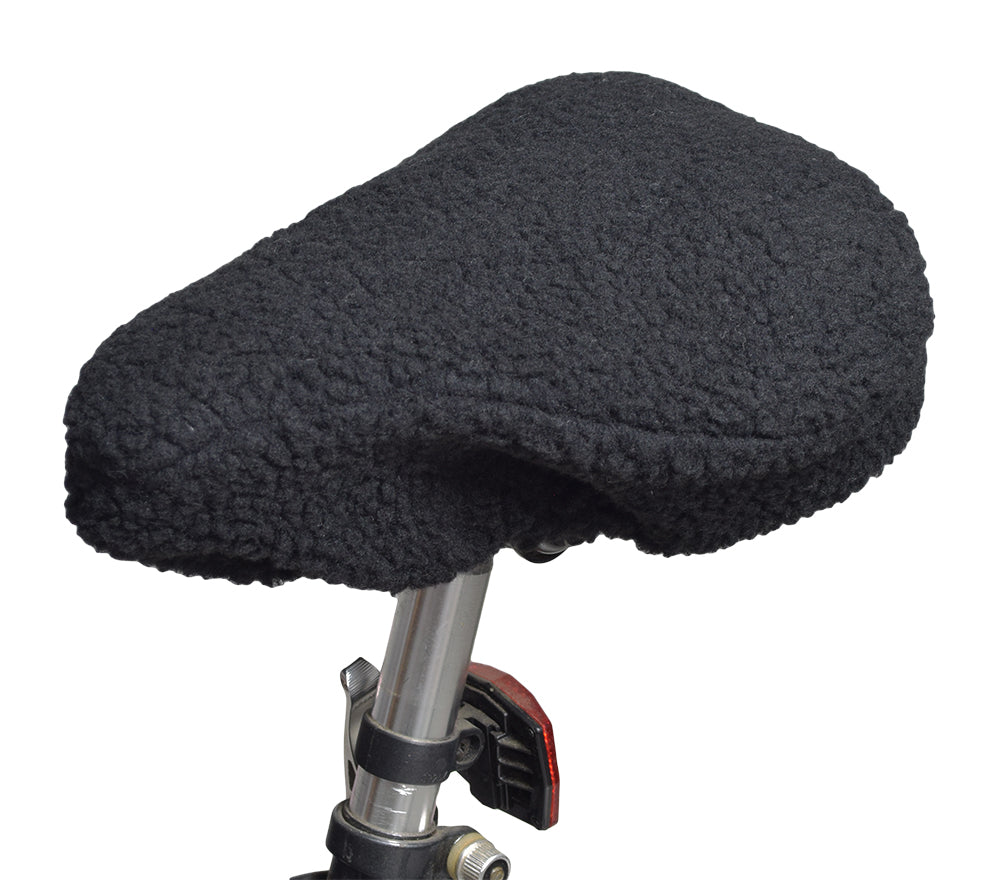 Universal Fleece Seat Cover for Bike & Scooter Seats, shown as a plush, thick-pile cover fitted on a bicycle seat, providing a fluffy and comfortable biking experience.