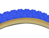 20x2.125 Blue MX3/C714 Bicycle Tire, showcasing a close-up of its knobby BMX tread and skin sidewalls, designed for durability and performance.