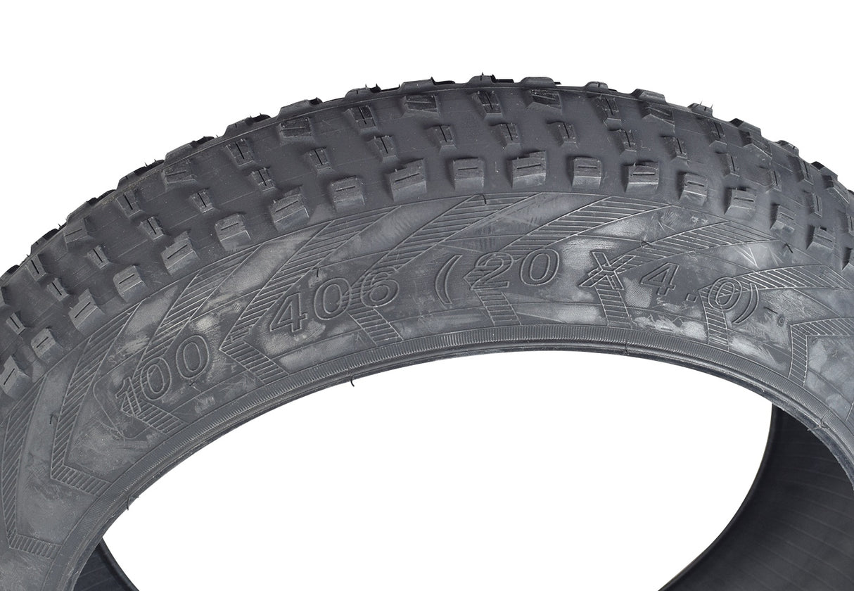 Close-up of a 20x 4.0 tire for the Swagtron EB6 Bandit Fat Tire Electric Bike, showcasing its knobby tread pattern designed for excellent traction and cornering on all terrains.