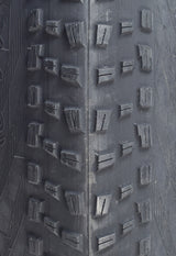 Close-up of a 20x 4.0 Tire for the Swagtron EB6 Bandit Fat Tire Electric Bike, featuring prominent knobby treads for superior all-terrain traction and reliable cornering and braking.