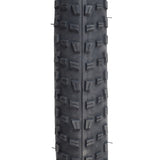 29x3.0 BFT+ Bicycle Tire featuring prominent black treads and robust side knobs, designed for aggressive all-mountain riding. Close-up highlights its high-volume casing and optimized tread for longevity and performance.