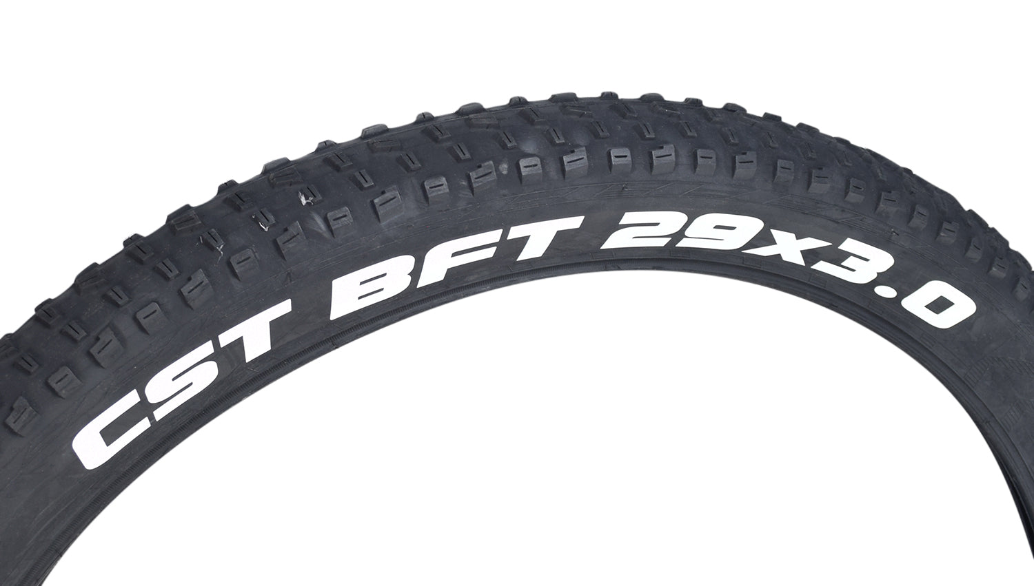 29x3.0 BFT+ Bicycle Tire with white text on the tread, featuring aggressive knobs and a high-volume casing for excellent traction and performance in all conditions.