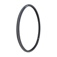 700x25 Czar Wire Bicycle Tire with grooved lateral tread and smooth center, emphasizing dual compound construction for enhanced traction and durability, shown in a close-up view.