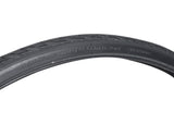 Close-up of a 700x32 Reflective Road Cruiser Active Twin K-Guard Bicycle Tire showcasing its directional tread and reflective sidewall striping for road and trekking use.