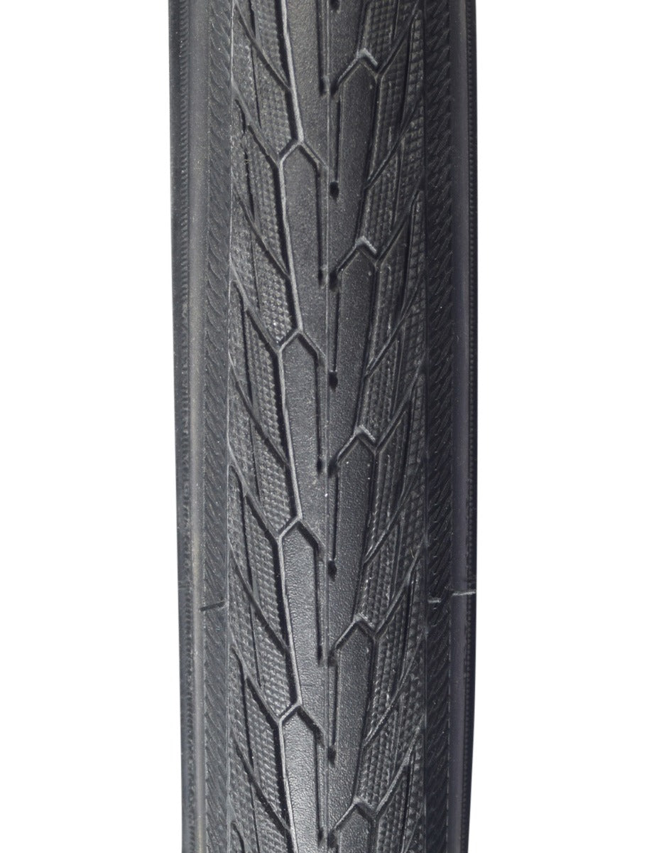 Close-up of a 700x32 Reflective Road Cruiser Active Twin K-Guard Bicycle Tire, highlighting the directional tread pattern with micro-knurled shoulders and reflective sidewall striping for enhanced visibility.