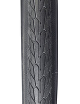 Close-up of a 700x32 Reflective Road Cruiser Active Twin K-Guard Bicycle Tire, highlighting the directional tread pattern with micro-knurled shoulders and reflective sidewall striping for enhanced visibility.