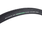 700x32 Reflective Road Cruiser Active Twin K-Guard Bicycle Tire featuring directional tread, smooth center section, micro-knurled shoulders, and reflective sidewall striping, designed for low rolling resistance and puncture protection.