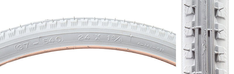 24x1-3/8 Kenda K142 Tire for Sport Wheelchairs, close-up showing white rubber with detailed tread and pressure markings, hand adjusting the tire.