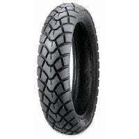 Close-up of the Kenda 110/70-12 Dual Sport Scooter Tire with K761 Tread, showcasing its aggressive tread pattern designed for versatile on or off-road use.