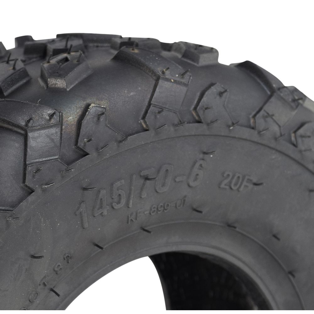 Close-up of a 145/70-6 tire with knobby tread, showcasing detailed tread patterns, designed for Coleman CC100X & CT100U mini bikes (Set of 2).