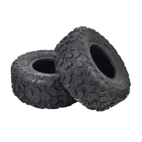 145/70-6 Tire with Knobby Tread for the Realtree RT100 Mini Bike (Set of 2); close-up of black tires showcasing knobby tread design for enhanced traction and performance on various surfaces.