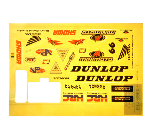 Label Sheet for the Minimoto Sport Racer, featuring various logos and designs on a yellow background, ideal for customizing the Toyquest racer.