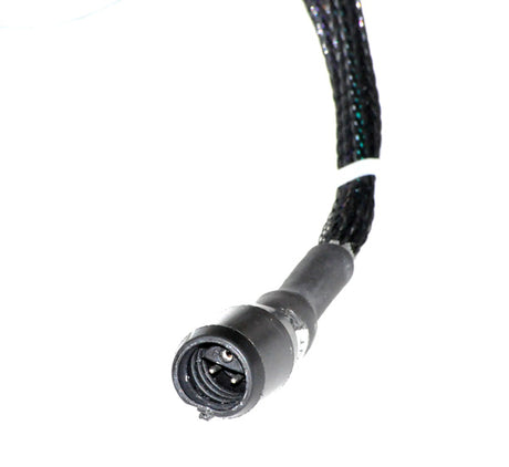 Close-up of the Left Front Light and Blinker Assembly for Pride Legend XL (SC3450), showing part of the black electronic harness and connector cable.