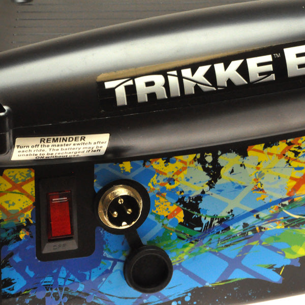 Close-up view of the Razor Trikke E2 electric scooter's left and right battery compartments, highlighting the device's intricate electrical components essential for protecting the batteries and other parts.