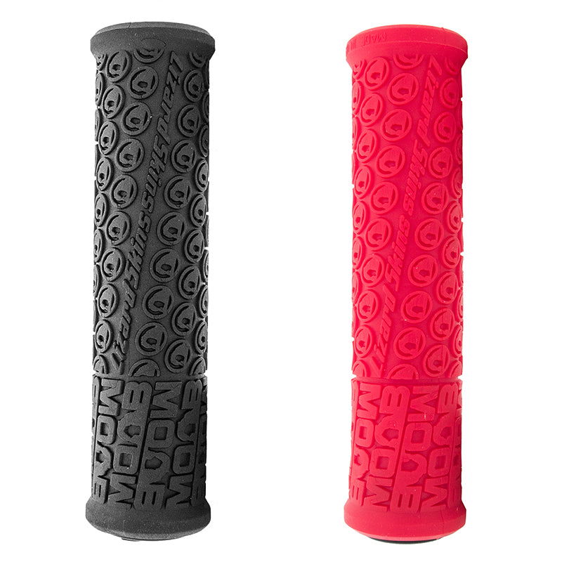 Close-up of the 130 mm Single Compound Moab Grips for Bikes & Scooters, showcasing the handlebar grip texture and rubber tire for enhanced comfort and durability.