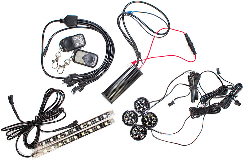 Light Kit for Mobility Scooters and Power Chairs featuring a set of electrical components, including light pods, strips, and two remote controls for different lighting modes.