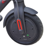 Close-up of a wheel with the Red Reflective Sticker Set for the Xiaomi Mi M365 electric scooter, including U-shaped and straight reflective pieces.