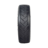 8-1/2x 2 Pneumatic Tire for the Xiaomi Mi M365 electric scooter, featuring a close-up of black tread with shallow grooves for a smoother ride on hard pavement.