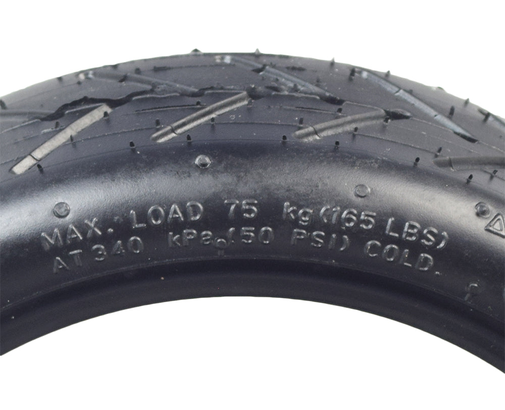 Close-up of an 8-1/2x 2 Pneumatic Tire for the Xiaomi Mi M365, highlighting the shallow, low-siped tread designed for smooth rides on hard pavement.