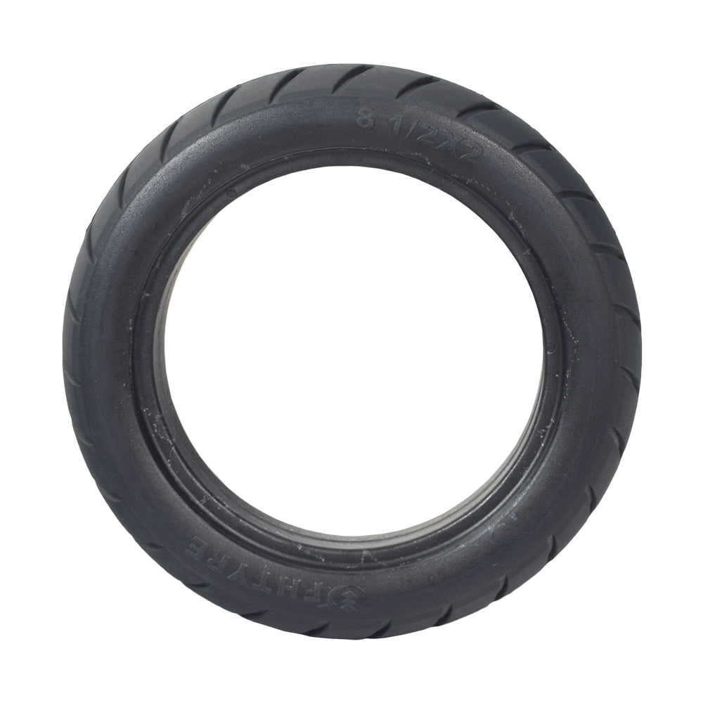 8-1/2x 2 Solid Tire for the Xiaomi Mi M365, a black puncture-proof, durable rubber tire with visible tread, designed for electric scooters, ensuring reliability and longevity without the risk of flats.