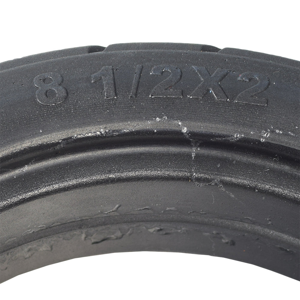 8-1/2x 2 Solid Tire for the Razor T25 Electric Scooter, showing a close-up of the black tire with visible tread pattern and numbers imprinted on the rubber surface.