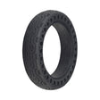 8.5x 2 Solid Honeycomb Tire for the Xiaomi Mi M365, showcasing a black tire with holes around the radius for shock absorption and a black rim, designed for flat-free performance.