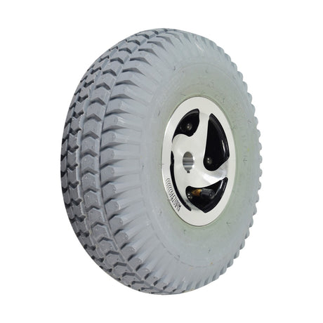 3.00-4 (10x3, 260x85) Pneumatic Rear Wheel Assembly for Rascal 235, 245, 305, 600 Series, showing a close-up of the heavy-duty tire with a black rim and detailed tread.