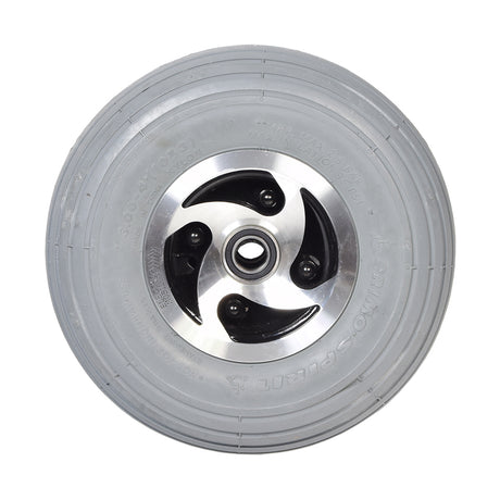 3.00-4 (10x3, 260x85) Foam Filled Front Wheel Assembly for Rascal 600 Series mobility scooters, featuring a silver metal rim and foam-filled tire for flat-free mobility.