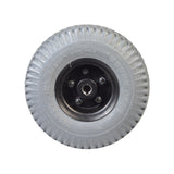 3.00-4 (10x3, 260x85) Flat-Free Rear Wheel Assembly for Merits Regal (P310) Power Chair, showcasing a black rim and a solid, flat-free tire with a floor-gripping tread.