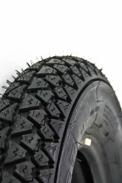 Close-up of the Michelin 3.00-10 S83 Retro Scooter Tire, highlighting its detailed tread pattern and robust construction, ideal for vintage scooters from brands like Vespa and Yamaha.