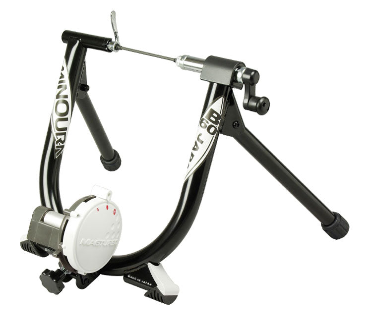 Minoura B60-D Bicycle Trainer displayed with a sturdy U-shaped frame, 38mm steel tubing, and 29mm wide-stance legs, showcasing its robust construction and essential features for indoor training.