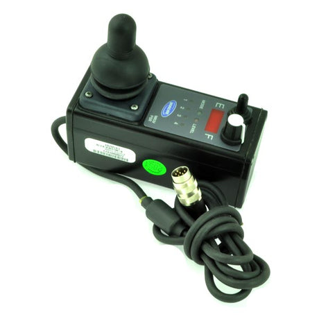 MKIV PSR Joystick Controller for Invacare Power Chairs, shown with a remote control and attached 6-pin connector cable, designed for Storm series power chairs with four drive modes and a speed dial.