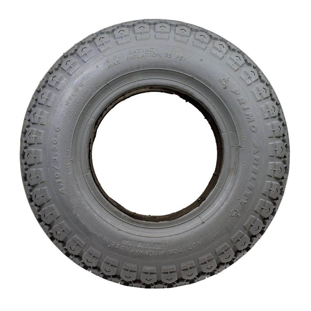 4.10/3.50-6 Foam-Filled Mobility Tire with C168G Ability Tread, showing a close-up of the knobby tread pattern and central hole, ideal for mobility scooters and power chairs.