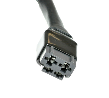 Close-up of a black connector from the Motor Assembly for the 2nd Generation Pride Hurricane PMV5001 mobility scooter.