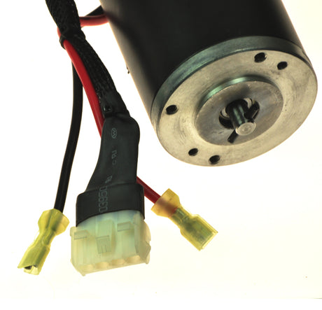 Close-up of the Motor and Brake Assembly for the Go-Go Travel Vehicle (SC40), Pride Bebop (SC46), and Pride Pep Pal (MM222) scooters, showing the motor, brake, and attached black cable.